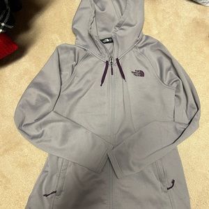Women North Face Jacket  size large.  Grey with purple accents.